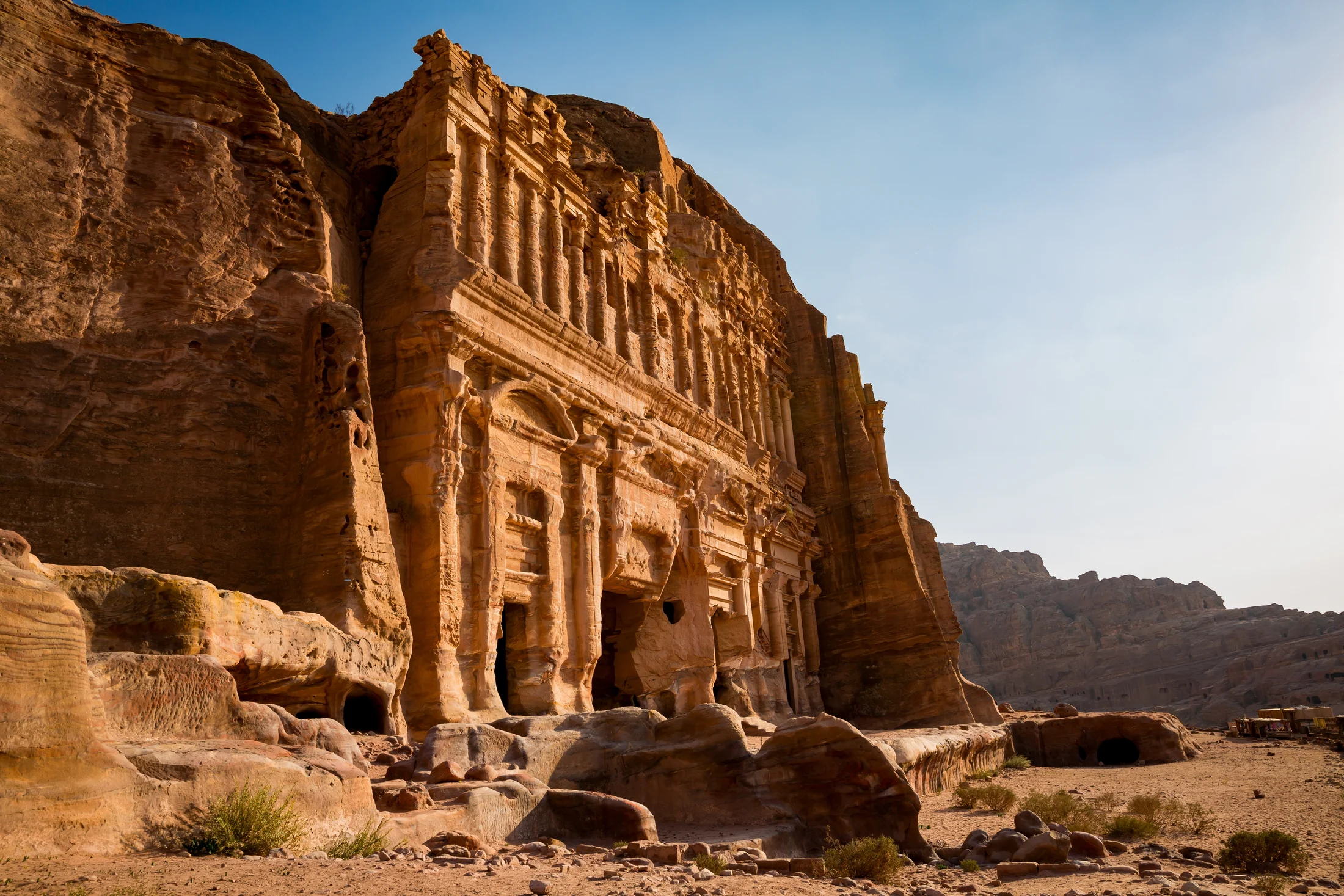 The rock-cut Monastery at Petra illuminated by warm desert light